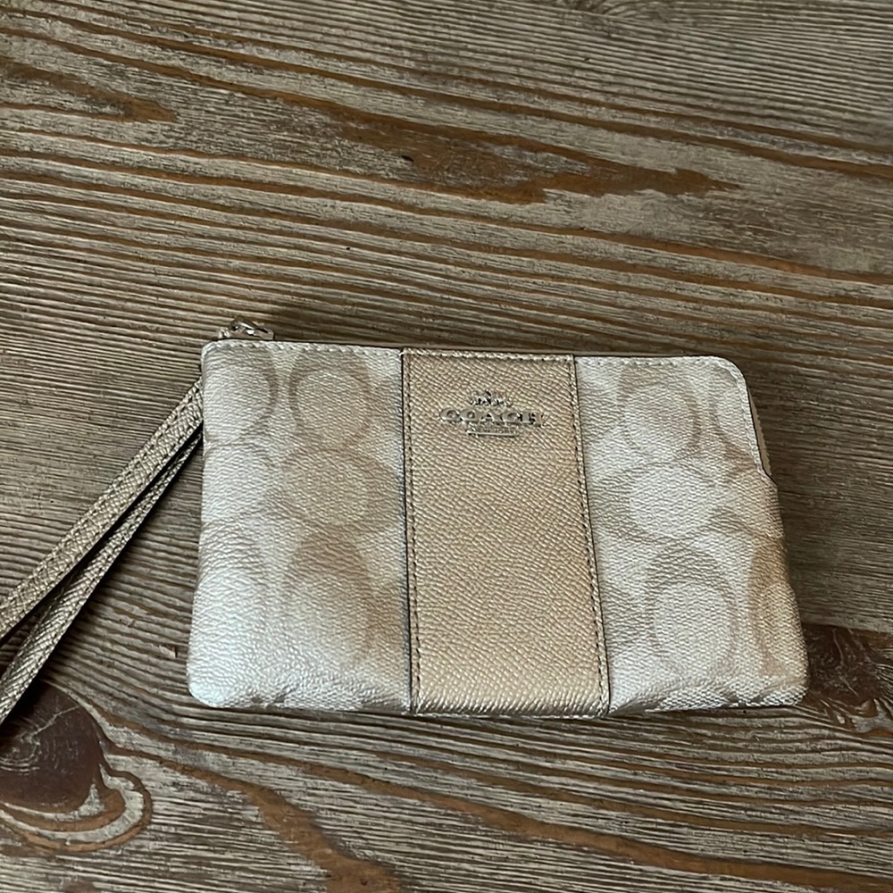 Coach gold and tan wristlet